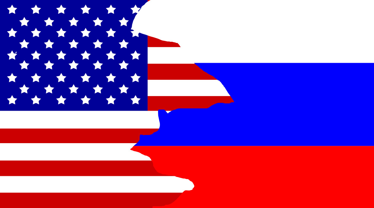 połączone se sobą flagi USA i Rosji. łączenie wyglada jakby było peknięciem.